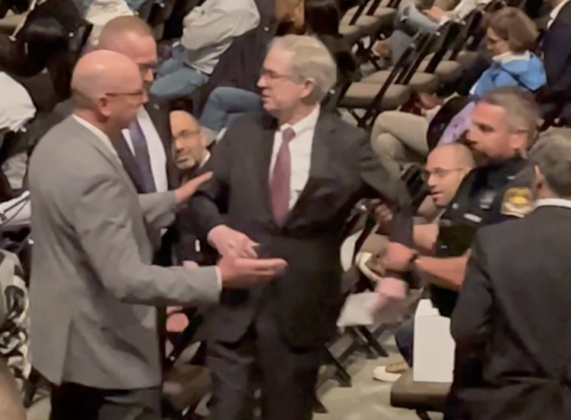 Why Was An Investor Arrested At A Shareholder Meeting For Asking Warren Buffett Questions About Jeffery Epstein?